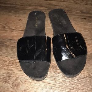 Calvin Klein black patent slides